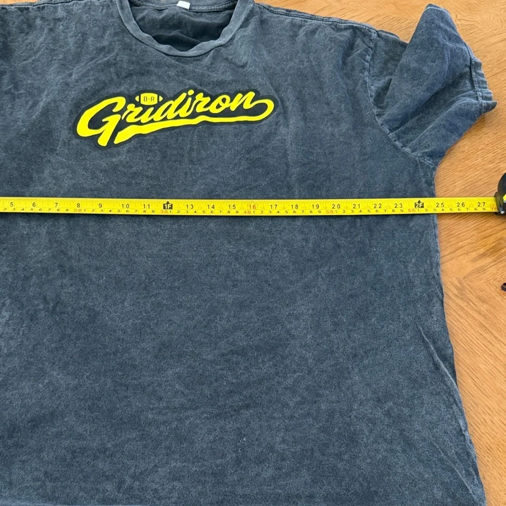 Black Men Gridiron T-Shirt with skeleton playing football as back hit  Logo - Picture 4 of 5